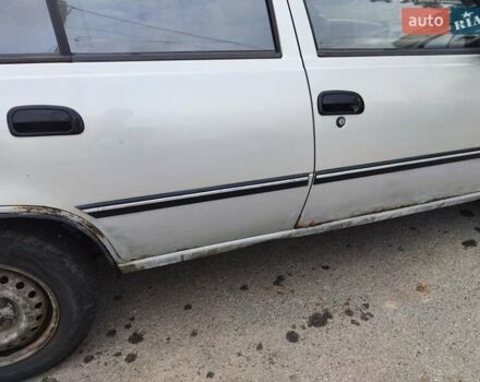 Сірий Деу Нексія, об'ємом двигуна 1.5 л та пробігом 221 тис. км за 1195 $, фото 2 на Automoto.ua