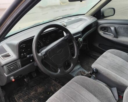 Сірий Деу Нексія, об'ємом двигуна 1.5 л та пробігом 200 тис. км за 800 $, фото 7 на Automoto.ua