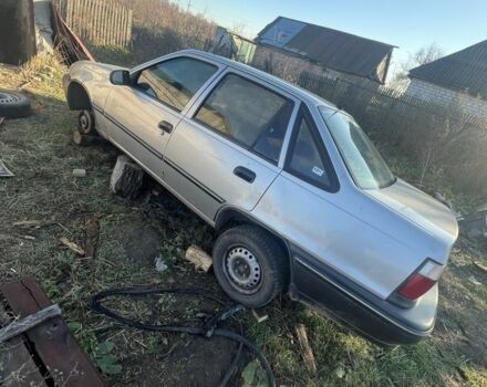 Сірий Деу Нексія, об'ємом двигуна 1.5 л та пробігом 77 тис. км за 566 $, фото 3 на Automoto.ua