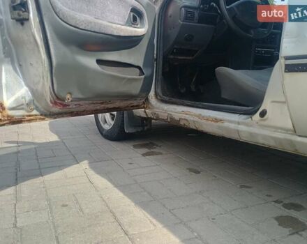 Сірий Деу Нексія, об'ємом двигуна 1.5 л та пробігом 144 тис. км за 1328 $, фото 13 на Automoto.ua