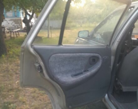 Сірий Деу Нексія, об'ємом двигуна 0 л та пробігом 268 тис. км за 900 $, фото 5 на Automoto.ua