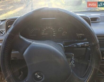 Сірий Деу Нексія, об'ємом двигуна 1.6 л та пробігом 400 тис. км за 1200 $, фото 8 на Automoto.ua