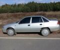 Сірий Деу Нексія, об'ємом двигуна 1.5 л та пробігом 128 тис. км за 2300 $, фото 1 на Automoto.ua