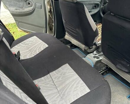 Сірий Деу Нексія, об'ємом двигуна 1.5 л та пробігом 246 тис. км за 2350 $, фото 4 на Automoto.ua