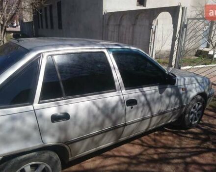 Серый Дэу Нексия, объемом двигателя 1.5 л и пробегом 210 тыс. км за 1900 $, фото 3 на Automoto.ua