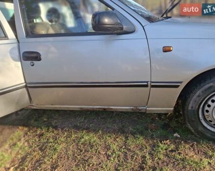 Сірий Деу Нексія, об'ємом двигуна 1.6 л та пробігом 400 тис. км за 1200 $, фото 2 на Automoto.ua