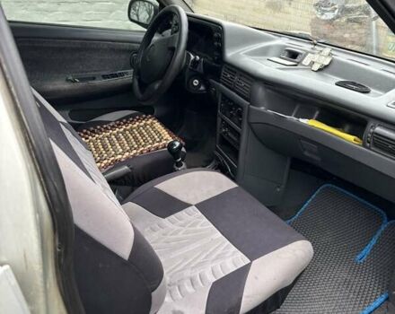 Сірий Деу Нексія, об'ємом двигуна 1.5 л та пробігом 246 тис. км за 2350 $, фото 2 на Automoto.ua