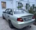 Сірий Деу Нексія, об'ємом двигуна 1.5 л та пробігом 183 тис. км за 1999 $, фото 1 на Automoto.ua