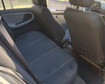 Сірий Деу Нексія, об'ємом двигуна 1.6 л та пробігом 400 тис. км за 1200 $, фото 7 на Automoto.ua