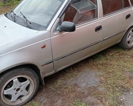 Сірий Деу Нексія, об'ємом двигуна 1.5 л та пробігом 1 тис. км за 1300 $, фото 1 на Automoto.ua