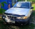 Сірий Деу Нексія, об'ємом двигуна 1.5 л та пробігом 230 тис. км за 2000 $, фото 2 на Automoto.ua