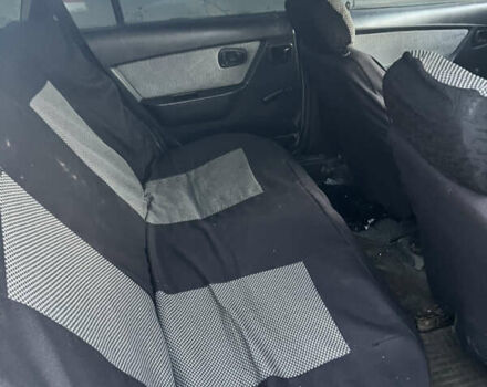 Сірий Деу Нексія, об'ємом двигуна 1.5 л та пробігом 130 тис. км за 1350 $, фото 10 на Automoto.ua