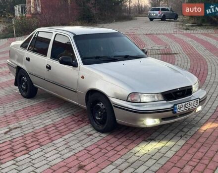 Сірий Деу Нексія, об'ємом двигуна 1.6 л та пробігом 249 тис. км за 1350 $, фото 3 на Automoto.ua