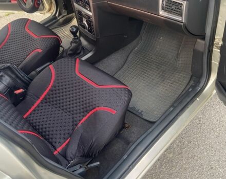 Сірий Деу Нексія, об'ємом двигуна 1.5 л та пробігом 129 тис. км за 3555 $, фото 9 на Automoto.ua