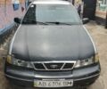Сірий Деу Нексія, об'ємом двигуна 1.5 л та пробігом 145 тис. км за 450 $, фото 1 на Automoto.ua
