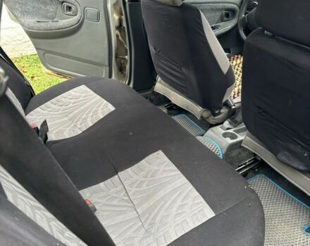 Сірий Деу Нексія, об'ємом двигуна 1.5 л та пробігом 246 тис. км за 2350 $, фото 3 на Automoto.ua