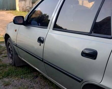 Сірий Деу Нексія, об'ємом двигуна 1.5 л та пробігом 208 тис. км за 1150 $, фото 2 на Automoto.ua