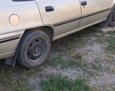 Сірий Деу Нексія, об'ємом двигуна 1.5 л та пробігом 208 тис. км за 1150 $, фото 3 на Automoto.ua