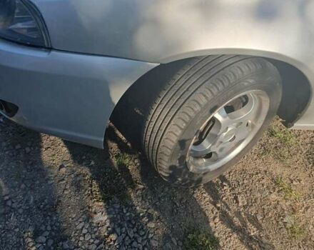 Сірий Деу Нексія, об'ємом двигуна 1.6 л та пробігом 260 тис. км за 1350 $, фото 6 на Automoto.ua