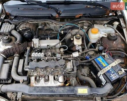 Серый Дэу Нексия, объемом двигателя 1.5 л и пробегом 158 тыс. км за 2000 $, фото 7 на Automoto.ua