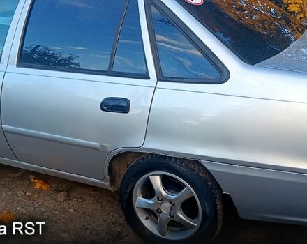 Сірий Деу Нексія, об'ємом двигуна 1.5 л та пробігом 227 тис. км за 2000 $, фото 1 на Automoto.ua