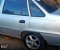 Сірий Деу Нексія, об'ємом двигуна 1.5 л та пробігом 227 тис. км за 2000 $, фото 1 на Automoto.ua