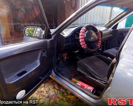 Сірий Деу Нексія, об'ємом двигуна 1.5 л та пробігом 487 тис. км за 1000 $, фото 1 на Automoto.ua