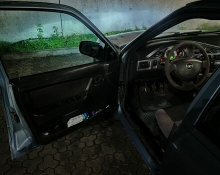 Сірий Деу Нексія, об'ємом двигуна 1.6 л та пробігом 332 тис. км за 1999 $, фото 4 на Automoto.ua