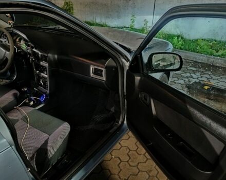 Сірий Деу Нексія, об'ємом двигуна 1.6 л та пробігом 332 тис. км за 1999 $, фото 6 на Automoto.ua