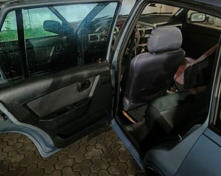 Сірий Деу Нексія, об'ємом двигуна 1.6 л та пробігом 332 тис. км за 1999 $, фото 5 на Automoto.ua