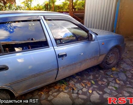 Сірий Деу Нексія, об'ємом двигуна 1.5 л та пробігом 487 тис. км за 1000 $, фото 9 на Automoto.ua