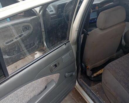 Сірий Деу Нексія, об'ємом двигуна 1.6 л та пробігом 200 тис. км за 949 $, фото 6 на Automoto.ua