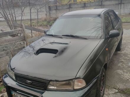 Сірий Деу Нексія, об'ємом двигуна 1.5 л та пробігом 251 тис. км за 1650 $, фото 1 на Automoto.ua