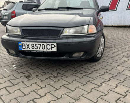 Серый Дэу Нексия, объемом двигателя 1.5 л и пробегом 259 тыс. км за 1300 $, фото 1 на Automoto.ua