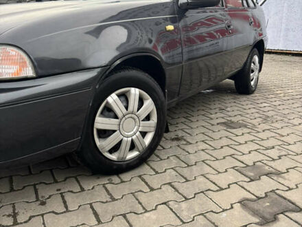 Сірий Деу Нексія, об'ємом двигуна 1.5 л та пробігом 285 тис. км за 1600 $, фото 1 на Automoto.ua