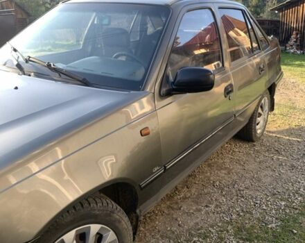 Сірий Деу Нексія, об'ємом двигуна 1.5 л та пробігом 250 тис. км за 1500 $, фото 1 на Automoto.ua