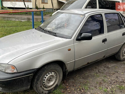 Сірий Деу Нексія, об'ємом двигуна 1.5 л та пробігом 135 тис. км за 1499 $, фото 1 на Automoto.ua