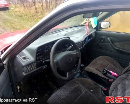 Серый Дэу Нексия, объемом двигателя 1.5 л и пробегом 167 тыс. км за 1000 $, фото 1 на Automoto.ua