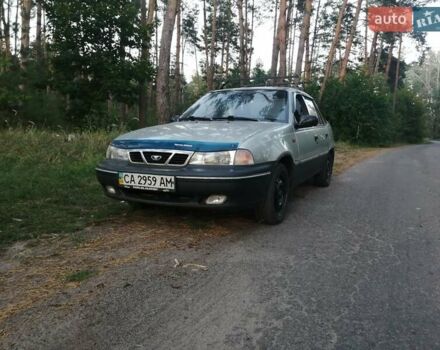 Сірий Деу Нексія, об'ємом двигуна 1.5 л та пробігом 430 тис. км за 1352 $, фото 1 на Automoto.ua