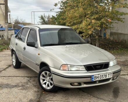 Сірий Деу Нексія, об'ємом двигуна 1.5 л та пробігом 250 тис. км за 1601 $, фото 1 на Automoto.ua