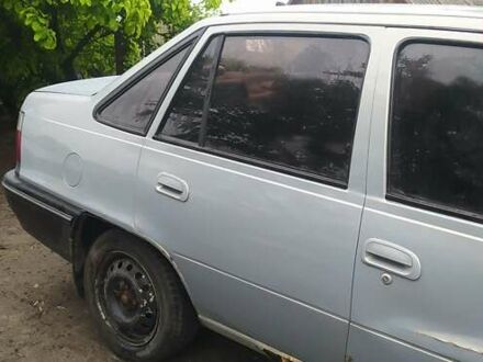 Сірий Деу Нексія, об'ємом двигуна 1.5 л та пробігом 334 тис. км за 351 $, фото 1 на Automoto.ua