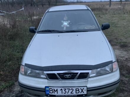 Сірий Деу Нексія, об'ємом двигуна 1.5 л та пробігом 200 тис. км за 1118 $, фото 1 на Automoto.ua