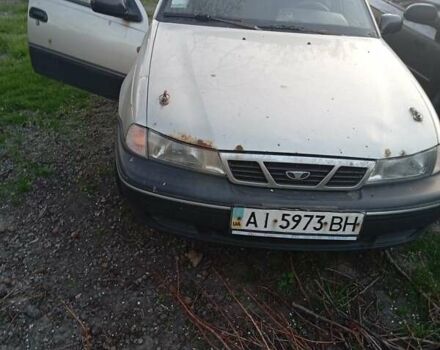 Сірий Деу Нексія, об'ємом двигуна 1.5 л та пробігом 335 тис. км за 604 $, фото 1 на Automoto.ua