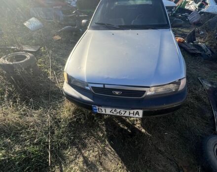 Сірий Деу Нексія, об'ємом двигуна 1.5 л та пробігом 77 тис. км за 566 $, фото 1 на Automoto.ua