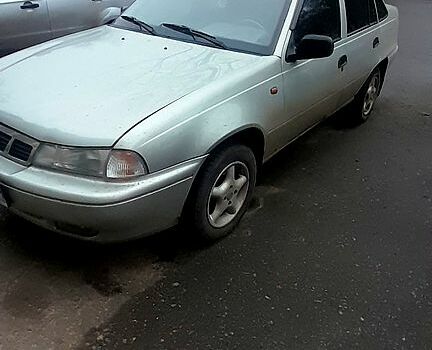 Сірий Деу Нексія, об'ємом двигуна 1.5 л та пробігом 199 тис. км за 1750 $, фото 1 на Automoto.ua