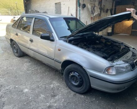 Серый Дэу Нексия, объемом двигателя 1.6 л и пробегом 245 тыс. км за 1900 $, фото 1 на Automoto.ua