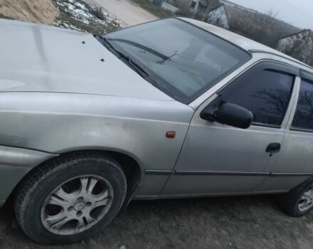 Серый Дэу Нексия, объемом двигателя 1.5 л и пробегом 318 тыс. км за 1300 $, фото 1 на Automoto.ua