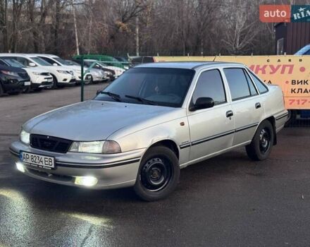 Сірий Деу Нексія, об'ємом двигуна 1.6 л та пробігом 249 тис. км за 1350 $, фото 1 на Automoto.ua