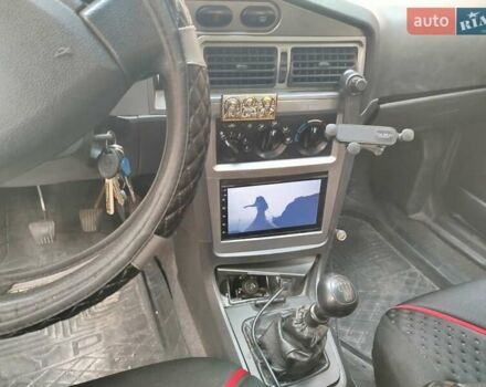 Сірий Деу Нексія, об'ємом двигуна 1.6 л та пробігом 213 тис. км за 1666 $, фото 1 на Automoto.ua