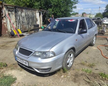Сірий Деу Нексія, об'ємом двигуна 1.5 л та пробігом 333 тис. км за 949 $, фото 1 на Automoto.ua